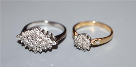 Two modern 18ct gold and diamond cluster dress rings, including white gold.